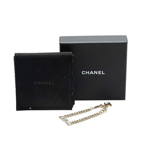 CHANEL Silver Logo Charm Bracelet